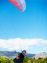 Man, parachute or paragliding sport in preparation exercise, healthy adventure or extreme fitness. Person, launch or Royalty Free Stock Photo