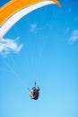 Man, paragliding and blue sky adventure fun in clouds for explore city, outdoor courage or fearless athlete. Male person