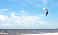 Parasailing in the Gulf of Mexico with beautiful blue sky and white sand Royalty Free Stock Photo