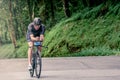 Man participating in triathlon with bicycle