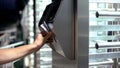 Man passing electronic turnstile, access control for business center, close-up