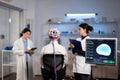 Man patient with eeg headset for brain scan standing in neurological laboratory