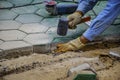 Workers is paving brick floors. Royalty Free Stock Photo