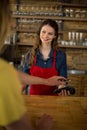 Man paying bill through smartphone using NFC technology Royalty Free Stock Photo