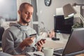 Man paying with credit card on smart phone Royalty Free Stock Photo