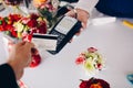 Man paying for flowers with his debit card. Royalty Free Stock Photo