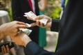 Man paying money bills to a woman in euros Royalty Free Stock Photo