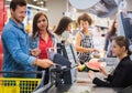 Man paying with NFC in a grocery store Royalty Free Stock Photo