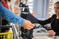 Man paying with a smartphone in a grocery store Royalty Free Stock Photo