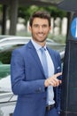 Man pays for parking with credit card Royalty Free Stock Photo