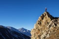 Man On Peak Looking At Mountains Royalty Free Stock Photo