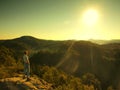 Man on the peak of sandstone rock in national park Royalty Free Stock Photo