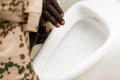 Man peeing in toilet bowl Royalty Free Stock Photo