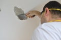 Man Peeling a Ceiling Royalty Free Stock Photo