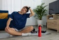 Man stretching his neck at home Royalty Free Stock Photo