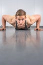 Man performing push ups at the gym Royalty Free Stock Photo