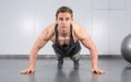 Man performing push ups at the gym Royalty Free Stock Photo