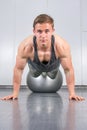 Man performing push ups at the gym Royalty Free Stock Photo