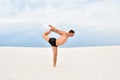 Man performing a yoga pose natarajasana