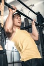 Man performs lifting excercise Royalty Free Stock Photo
