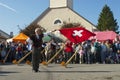Man performs traditional flag twirling in Affoltern Im Emmental, Switzerland.