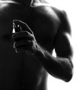 Man with perfume bottle Royalty Free Stock Photo