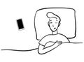 Man with a phone in the bed. Modern life with a smartphone. Distract from sleep. Annoying notifications