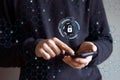 Man with phone, a concept of digital security with a lock icon. Royalty Free Stock Photo