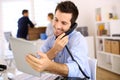 Man on the phone in office Royalty Free Stock Photo