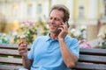 Man with phone is smiling. Royalty Free Stock Photo