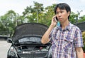 Man Phoning For Help with a broken down car Royalty Free Stock Photo