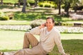 Man phoning in the park Royalty Free Stock Photo