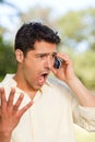 Man phoning in the park Royalty Free Stock Photo