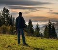 Man photographer in the mountains. Royalty Free Stock Photo