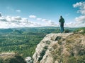 Man photographer taking picture of landscape when set tripod Royalty Free Stock Photo