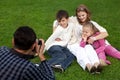 Man photographes his family outdoors Royalty Free Stock Photo