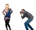 A man photographing a beautiful young woman Royalty Free Stock Photo