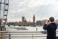 Man photographing London skyline