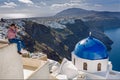 Man photographs island of Santorin Royalty Free Stock Photo