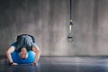 Man, physio ball and stretch for back strength, health or wellness in fitness studio. Sports trainer, working out and Royalty Free Stock Photo