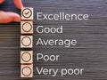 Man pick excellence rate. Business satisfaction and customer service experience survey concept. Royalty Free Stock Photo