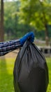 Man picking up plastic bottles, picking up trash in the world, cleaning the forest in the park. to preserve the charity environmen