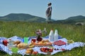 Man and Picnic on Sunny Day