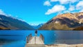 Man on the pier, Rotoiti River, Nelson Lakes National Park, New Zealand Royalty Free Stock Photo