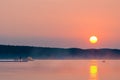 Man on the pier watching the beautiful sunset Royalty Free Stock Photo