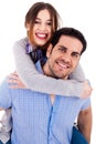 Man piggyback his girlfriend Royalty Free Stock Photo
