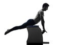 Man pilates chair exercises fitness isolated Royalty Free Stock Photo