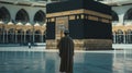 Man in pilgrim performing haj or umrah in front of kaaba, Mecca Royalty Free Stock Photo