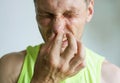 Man Pinches Nose Looks With Disgust Something Stinks Bad Smell Royalty Free Stock Photo