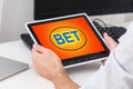 man placing bet with tablet computer, closeup Royalty Free Stock Photo